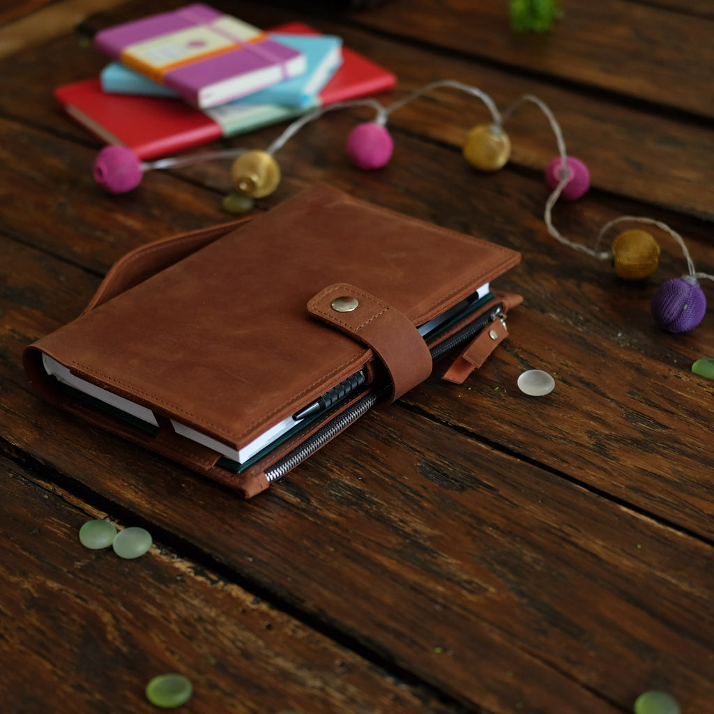 Leather cover with zip pocket and handle